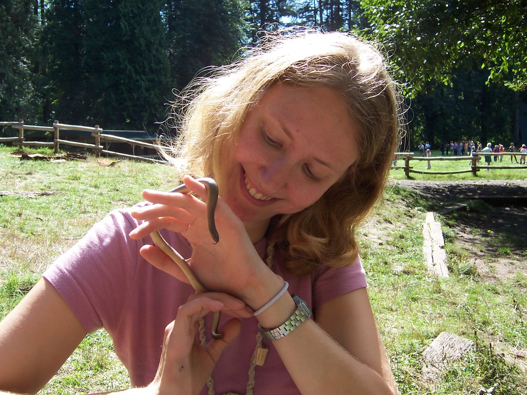 field instructor holding rubber boa