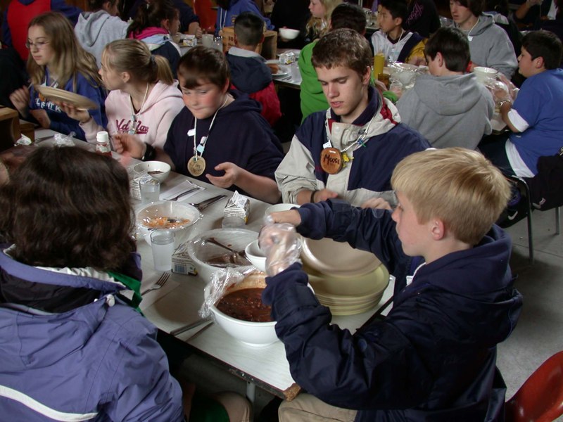 students eating family-style in the dining hall