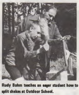 Rudy Bohm teaches an eager student how to split shakes at Outdoor School