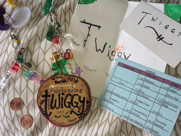 My wood cookie (name tag), “magic” pennies, and thank-you letters written by sixth graders.