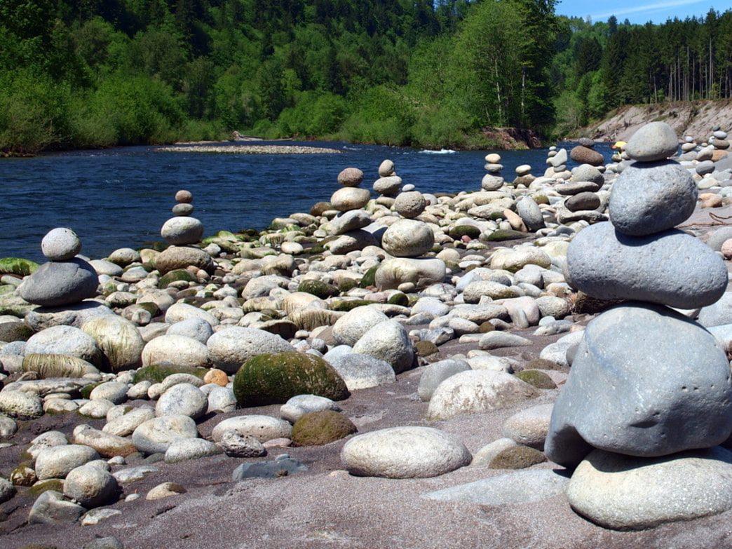 rocks on the sandy river